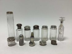 Collection of Victorian and later, silver topped toiletry bottles and other items