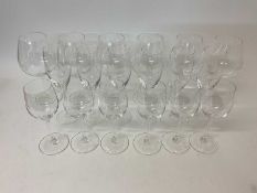 Six place setting Riedel glass champagne flutes, red and white glasses
