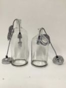 Two glass bottle hanging lanterns with grey cord fittings, 34cm and 28cm