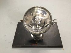 Mounted Headlight lamp, 24cm high, on 21cm x 33cm mount
