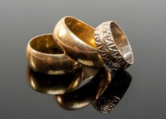 THREE 9CT GOLD RINGS, two plain and one engraved, 18.8gms gross (3) Provenance: deceased estate