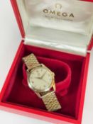 9CT GOLD OMEGA BRACELET WATCH, manual wind movement, champagne dial with Arabic and baton hour