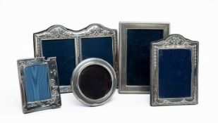 ASSORTED SILVER PHOTOGRAPH FRAMES including a double photoframe and matching single embossed