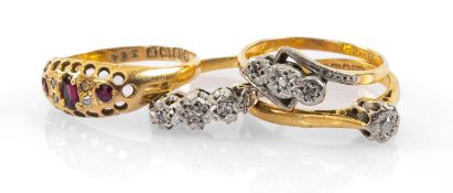 GOLD RINGS comprising four 18ct gold rings set with diamonds and garnets, 8.8gms gross (4)
