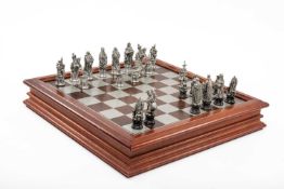 DANBURY MINT CAMELOT CHESS SET, antiqued pewter pieces, original wooden box Provenance: private