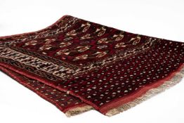 TURKOMAN BAG FACE, four columns of octagonal guls, fringe, 73 x 121cms