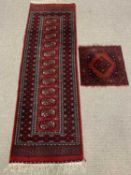 PERSIAN RED GROUND RUNNER & A SMALL PRAYER MAT, central block pattern of twelve matching motifs with