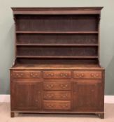 NORTH WALES OAK DRESSER circa 1840, wide boarded back three shelf rack, panel sided peg joined base,