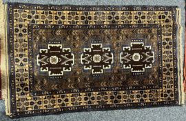 PERSIAN BLUE/BROWN GROUND HANDMADE WOOL RUG, triple medallion centre, floral border, 140 x 85ms