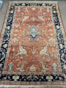 PERSIAN RED GROUND RUG, geometric border, 260 x 182cms Provenance: deceased estate Conwy