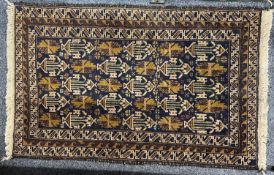 PERSIAN BLUE GROUND HANDMADE WOOL RUG, multiple medallion centre, geometric border, 126 x 80cms