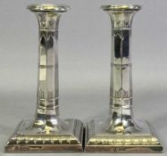 A PAIR OF GEORGE V SILVER CANDLESTICKS Sheffield 1920, Maker Thomas Bradbury & Sons Ltd, 13cm