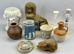 CERAMICA DEL FERLARO ITALIAN POTTERY FIGURE OF A SEATED DOG HOLDING BASKET OF FLOWERS, green