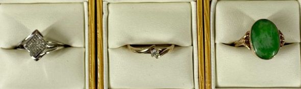 THREE 9CT GOLD DRESS RINGS, comprising 9ct white gold pave set diamond cluster ring, 0.25ct