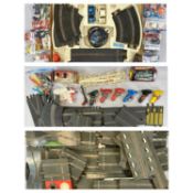 A LARGE QUANTITY OF SCALEXTRIC including a boxed GT Set 69 (incomplete), large quantity of track,