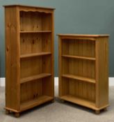 TWO MODERN PINE BOOKSHELVES with tongue and groove backs, both on bun feet, four shelf, 149.5 (h)