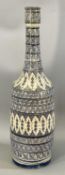 LARGE NORTH AFRICAN SAFI EARTHENWARE BOTTLE VASE, decorated with bands of blue geometric pattern