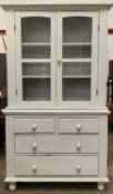 ANTIQUE PANTED PINE BOOKCASE CUPBOARD having twin glazed doors over a chest of two short over two