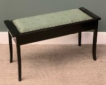 DUET MUSIC STOOL being ebonized with lift-top lid and music contents, 51 (h) x 94 (w) x 36 (d) cms