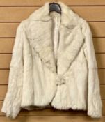 VINTAGE ERMINE EVENING JACKET, with full collar and long sleeves, size S/M Provenance: private