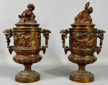 PAIR OF BRONZED CAST PEDESTAL URNS late 19th Century, in the manner of Clodion, twin-handles and