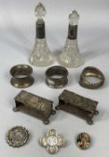 MIXED SILVER LOT including silver stands a pair, embossed strap tops and on bun feet, London 1910,