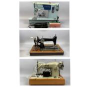 THREE VINTAGE SEWING MACHINES, Crester Electric, Singer Electric and one other manual in walnut case