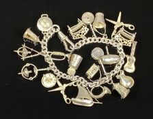 SILVER CHARM BRACELET WITH 20 CHARMS, 24.6gms Provenance: private collection Conwy