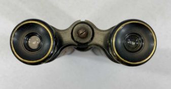 RARE PAIR OF KEPLERIAN BINOCULARS, lacquered brass with leather covered barrels, 28cms (l) closed,