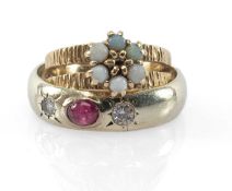 TWO GOLD RINGS comprising 9ct gold opal ring, and a 9ct gold three-stone diamond and ruby cabochon