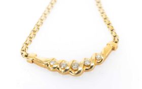 YELLOW METAL DIAMOND SET NECKLACE, the five graduating round brilliant cut stones measuring 0.