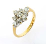 18CT GOLD DIAMOND CLUSTER RING, the nine round brilliant cut stones measuring 0.05cts each