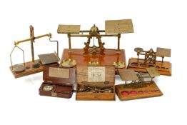 COLLECTION OF ANTIQUE BRASS SCALES including, postal/letter scales, one with associated weights,