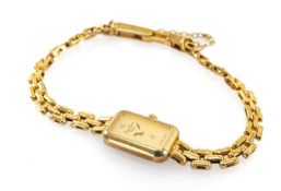 JEAN JACOT 9CT GOLD LADY'S WRISTWATCH, the rectangular dial signed and marked 'Q', integrated 9ct