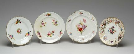 FOUR NANTGARW PLATES circa 1815-1820, comprising 'Tumbling Baskets' dessert plate, 21.4cms (diam),