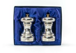 BOXED PAIR SILVER SALT & PEPPER MILLS, R.J. Carr, Sheffield 2001, 10cms (h) (2) Provenance: