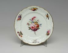 NANTGARW PORCELAIN PLATE FROM THE BRACE SERVICE circa 1818-1820, having C-scroll moulded border,