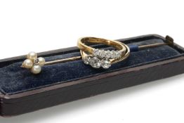 TWO DIAMOND RINGS & STICK PIN, the rings platinum set with three and five stones respectively, to
