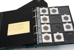 GREEN LEUCHTTURM COIN ALBUM containing assorted Chinese coins including various copper dragon