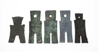 GROUP OF FIVE CHINESE SPADE COINS comprising believed three Wang Mang Huo Pu spade coins, believed