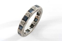 14CT WHITE GOLD, DIAMOND & SAPPHIRE ETERNITY RING, alternately set with 11 square cut sapphires