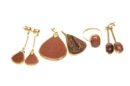 GROUP OF GOLDSTONE ITEMS OF JEWELLERY comprising ring, two pendants and pair of earrings stamped '