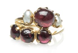 TWO YELLOW METAL DRESS RINGS comprising three stone cabochon pink gem ring, stamped '22K', and