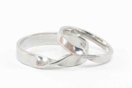 PAIR PLATINUM 'HIS & HERS' WEDDING BANDS, Pravins Ltd., London 2012, with twisted shank, ring