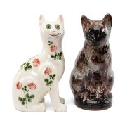 TWO MODERN STUDIO POTTERY CATS, comprising of Ewenny Pottery tortoiseshell glazed seated cat, 34 cms
