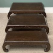 CHINESE NEST OF THREE CARVED COFFEE TABLES with curved ends, 35 (h) x 92 (w) x 46cms (d) the largest