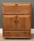 LIGHT ERCOL BUREAU with fall front top over two cupboards doors and a base drawer, 110 (h) x 83 (