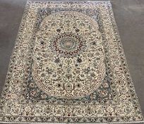 EASTERN FINE NAIN RUG, cream ground with oval central design and multiple pattern border, 354 x