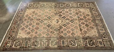 EASTERN JOSHAGAN RUG, beige ground with central repeating diamond pattern and surround border, 330 x