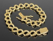 9CT GOLD SOLID FLAT CURB LINK BRACELET, 22cms (l), 36.4gms Provenance: private collection Conwy